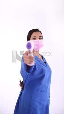 A woman wearing a mask