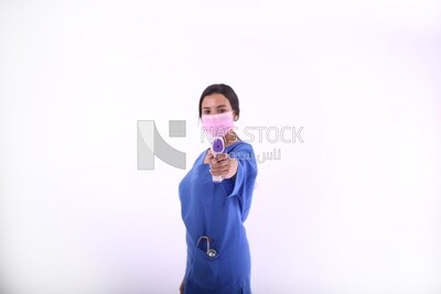 A woman wearing a mask
