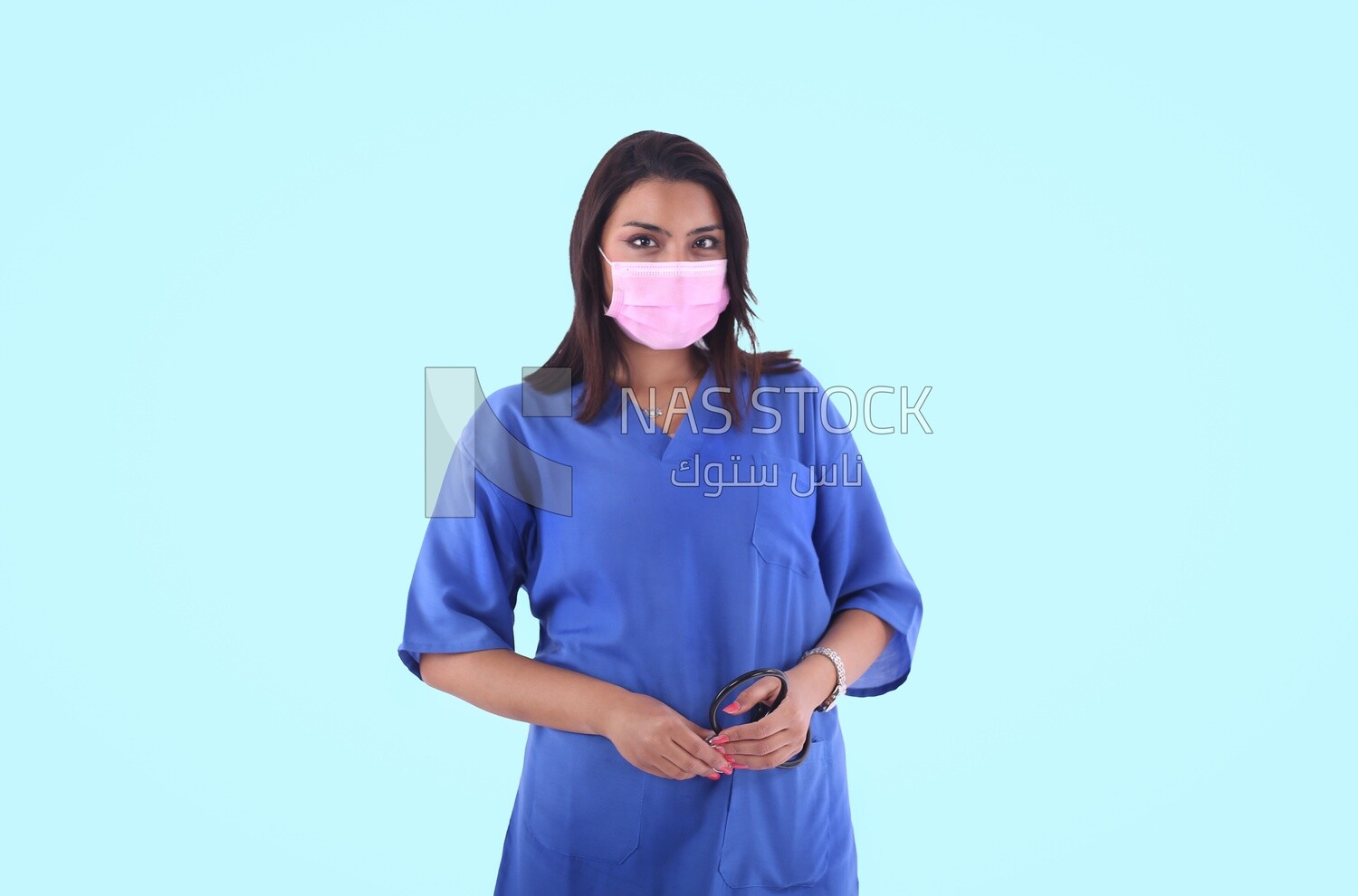 A woman doctor wearing a mask