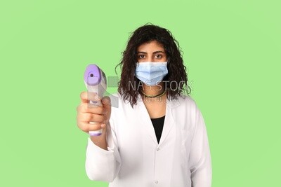 A woman wearing a mask