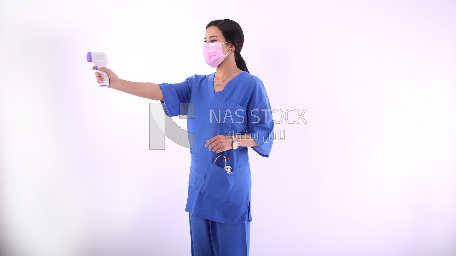A woman wearing a mask