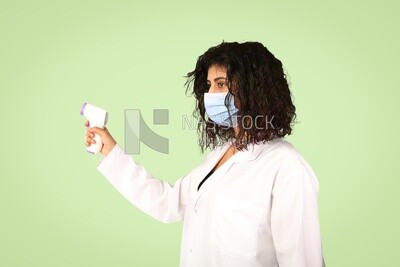 A woman wearing a mask