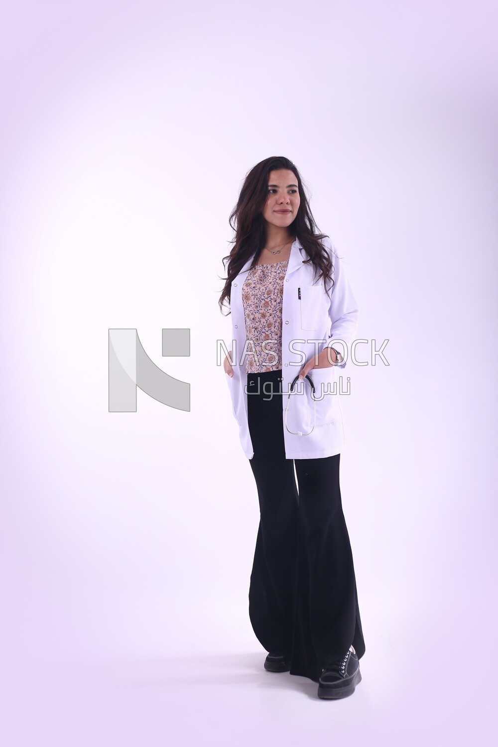 A woman doctor wearing a white coat