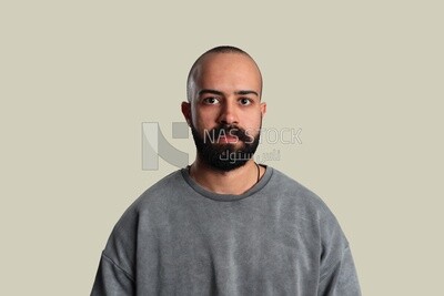 Young man standing silently