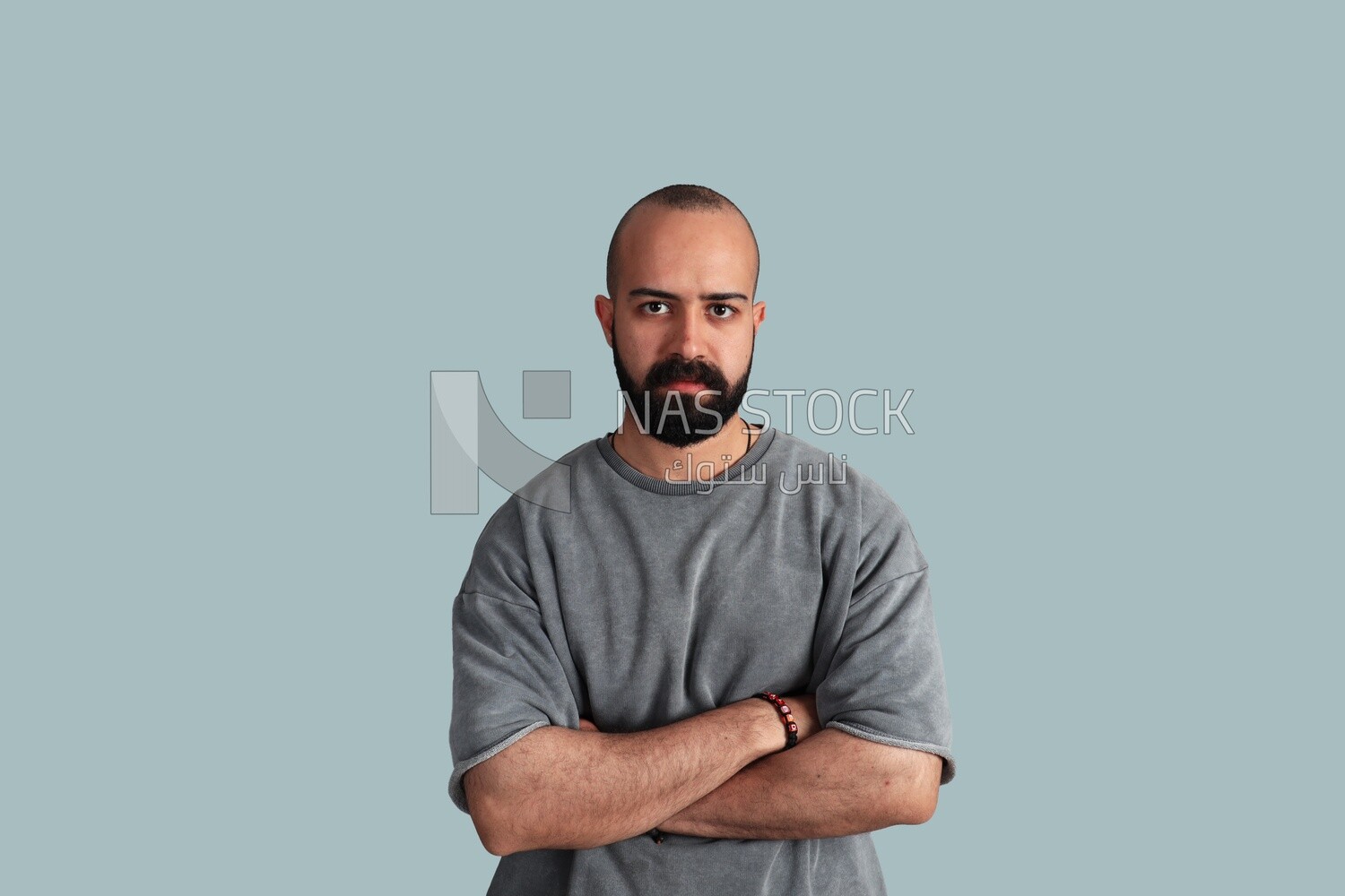 young man put his hand on his chest