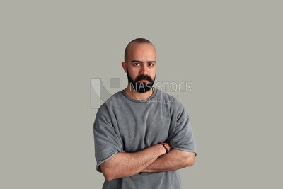 young man put his hand on his chest