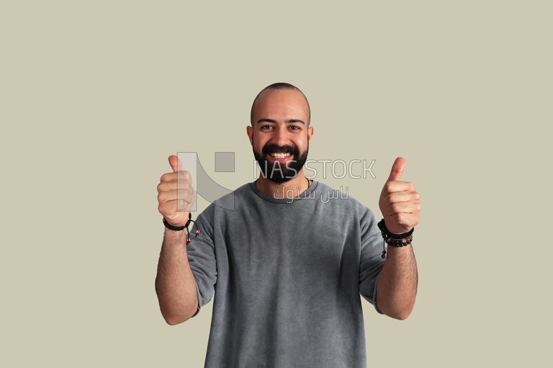 young man with a thumbs up