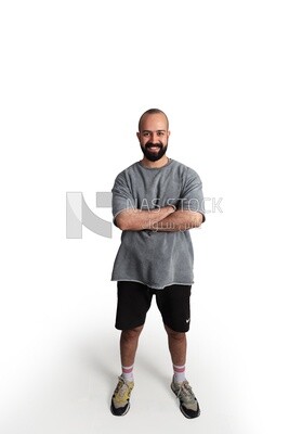 young man clasps his hand on his chest