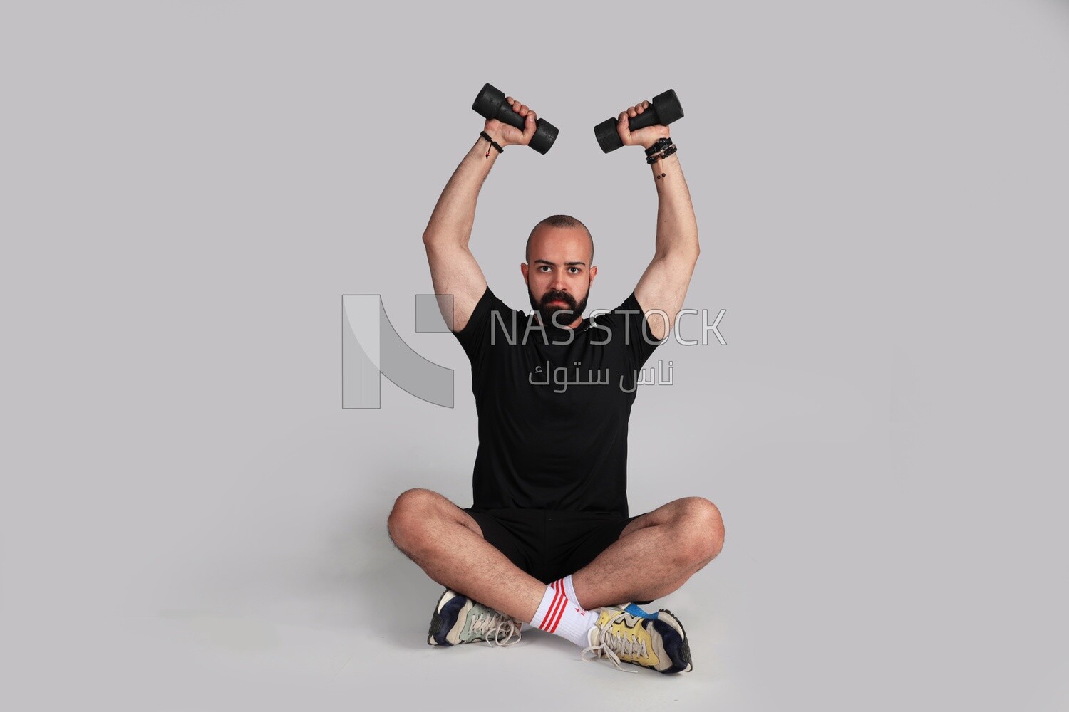 sportsman doing arm exercises