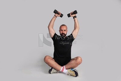 sportsman doing arm exercises