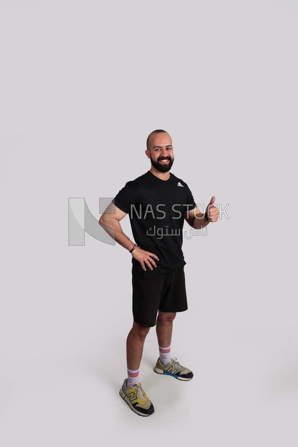 Coach with thumbs up