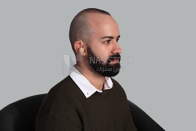 man suffering from hearing impairment