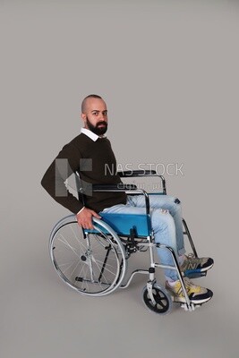 Disabled guy sitting in a wheelchair