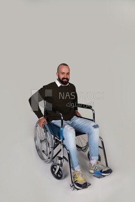 Disabled man sitting in a wheelchair