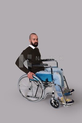 Disabled guy sitting in a wheelchair