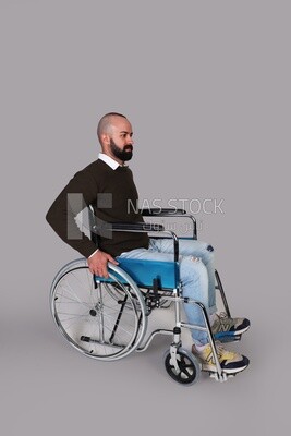 Disabled guy sitting in a wheelchair