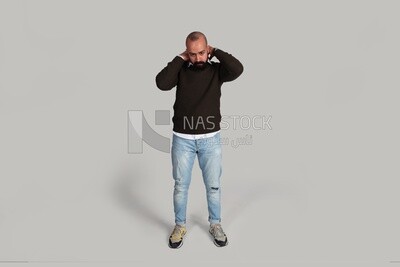 man arranging his clothes