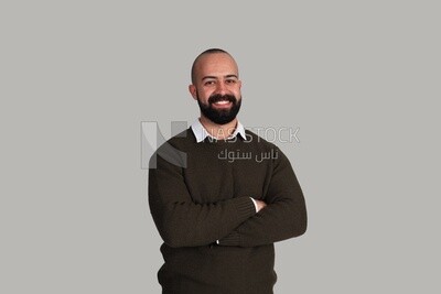 man clasping his hand across his chest