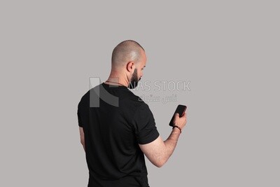 man looking at his phone