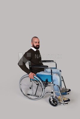 Disabled guy sitting in a wheelchair
