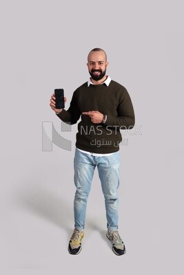 man pointing at his smartphone