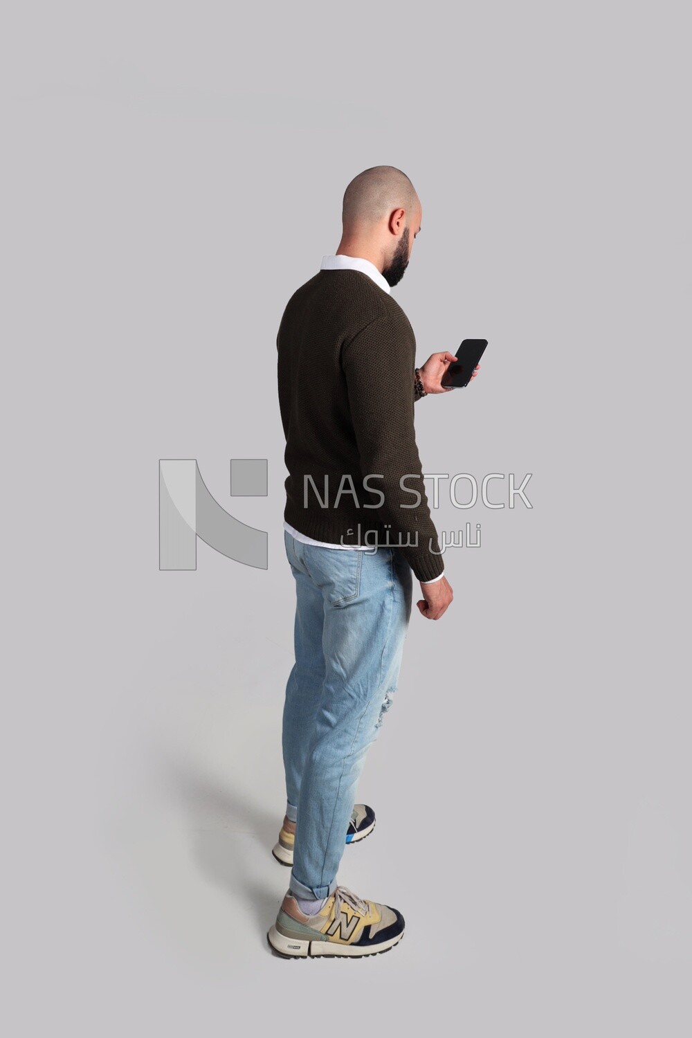 man holding his smartphone