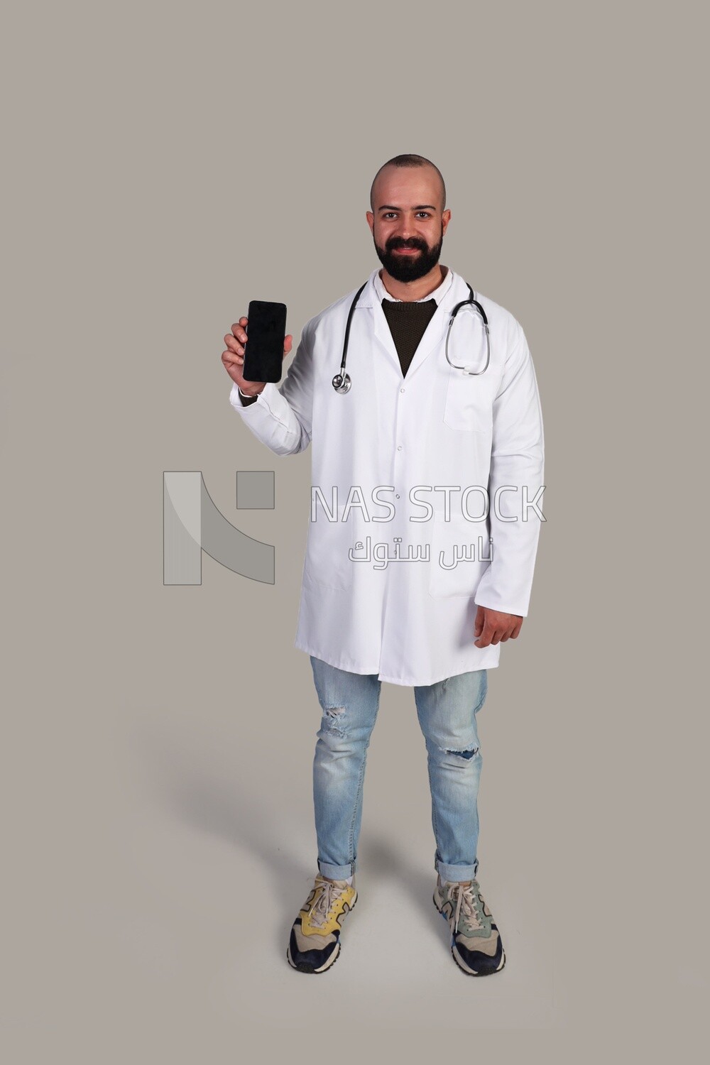 doctor holding his phone