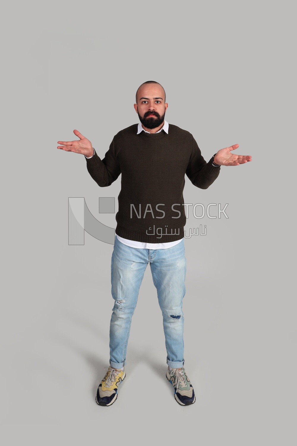 man is standing, wondering