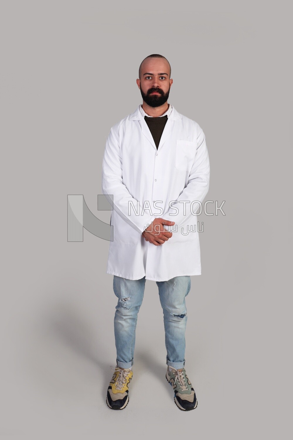 doctor standing in a hospital uniform
