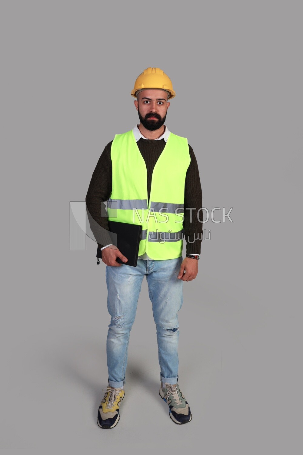 worker&#39;s supervisor holding a notebook