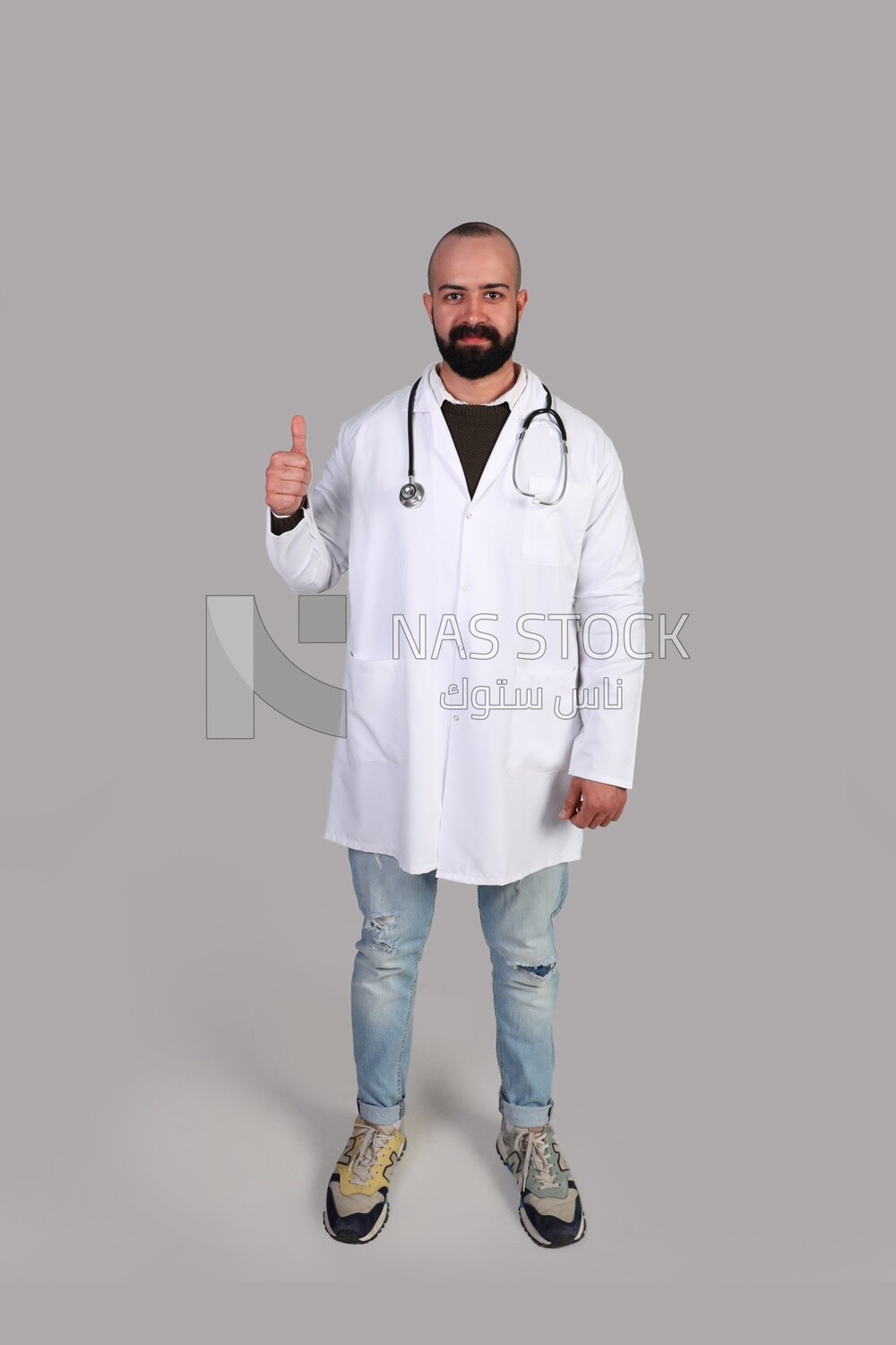 doctor raising his thumb