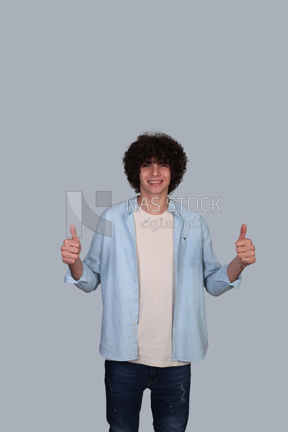 young man with thumb up