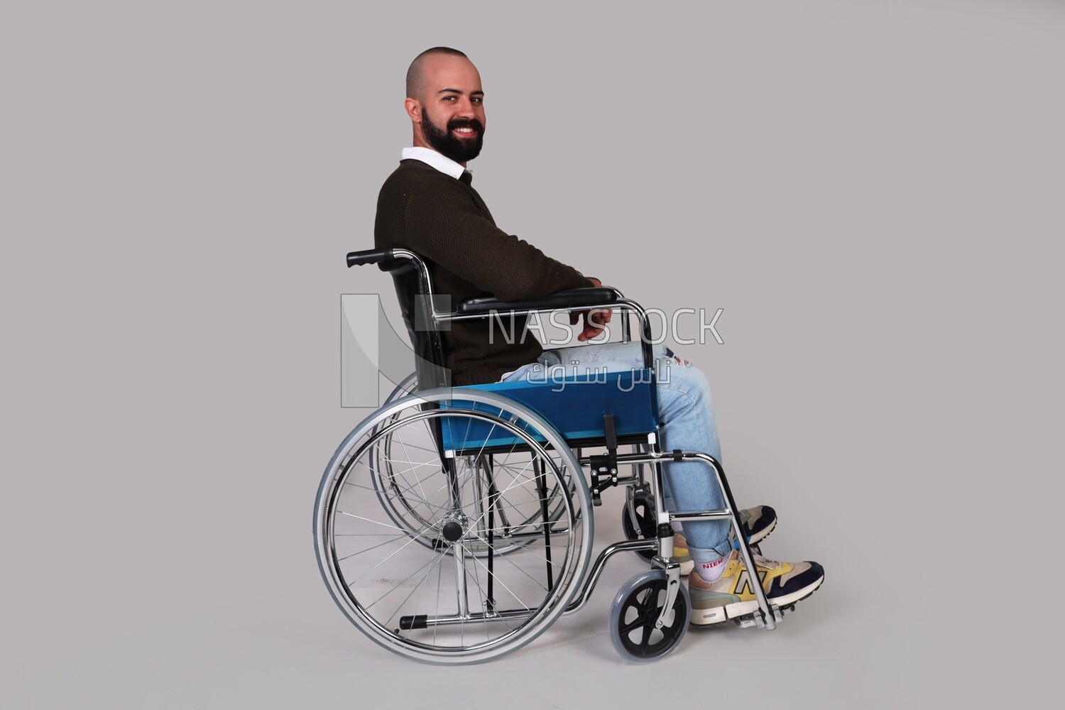 Disabled guy sitting in a wheelchair