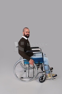 Disabled guy sitting in a wheelchair