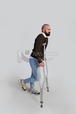 Man with crutch