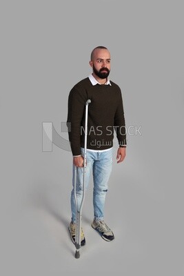 Man with crutch
