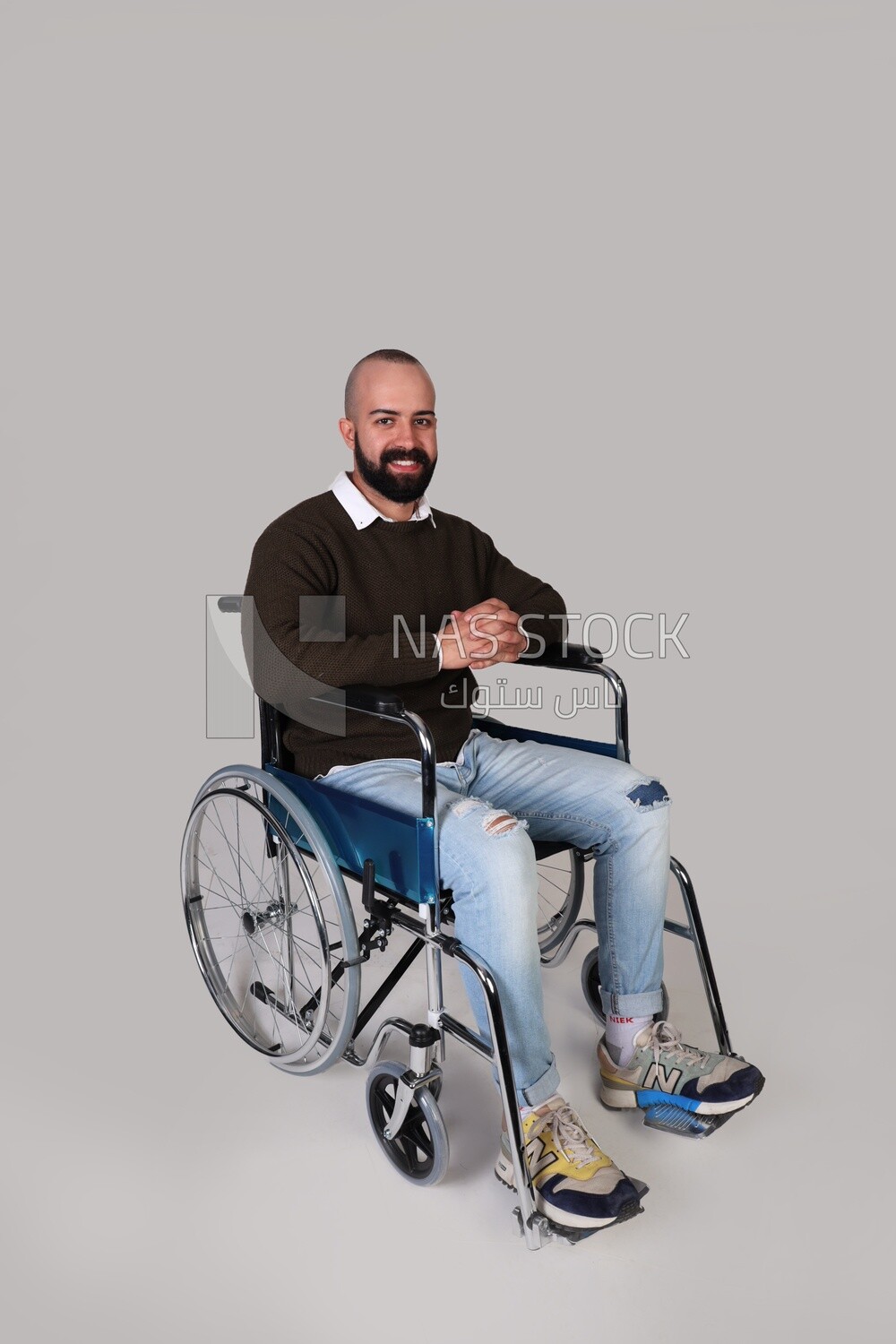Disabled guy sitting in a wheelchair