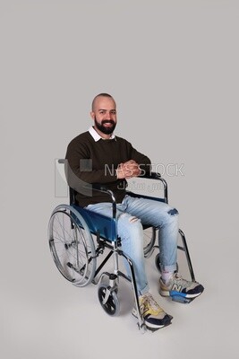 Disabled guy sitting in a wheelchair