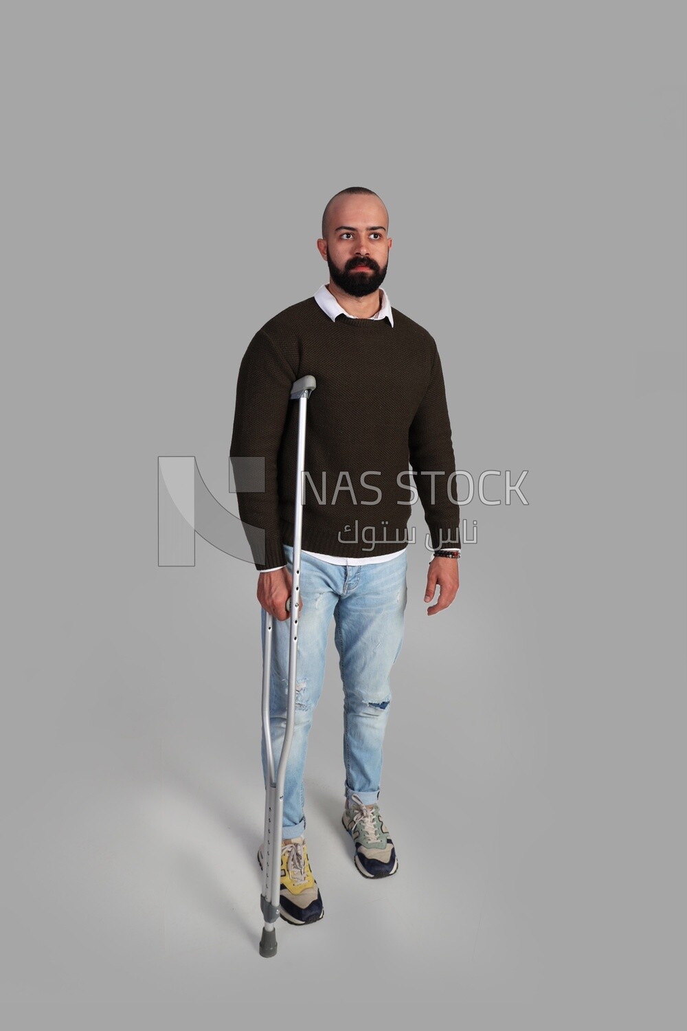 Man with crutch