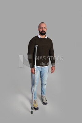 Man with crutch