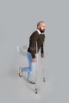young man with a leg problem ,side view​