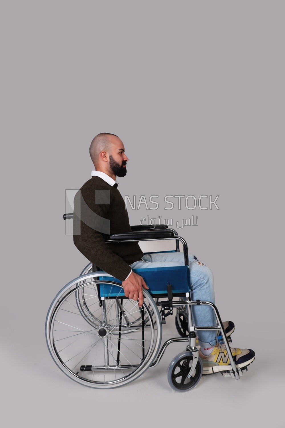 Disabled guy sitting in a wheelchair