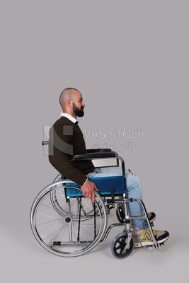Disabled guy sitting in a wheelchair