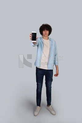 handsome young man pointing his phone at the camera