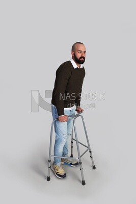 Injured young man on crutches