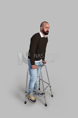 Injured young man on crutches