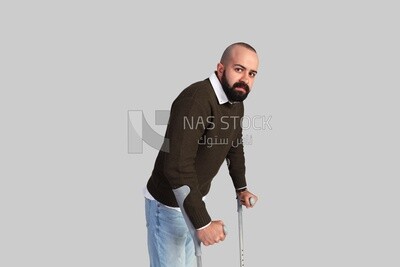 Man with crutch