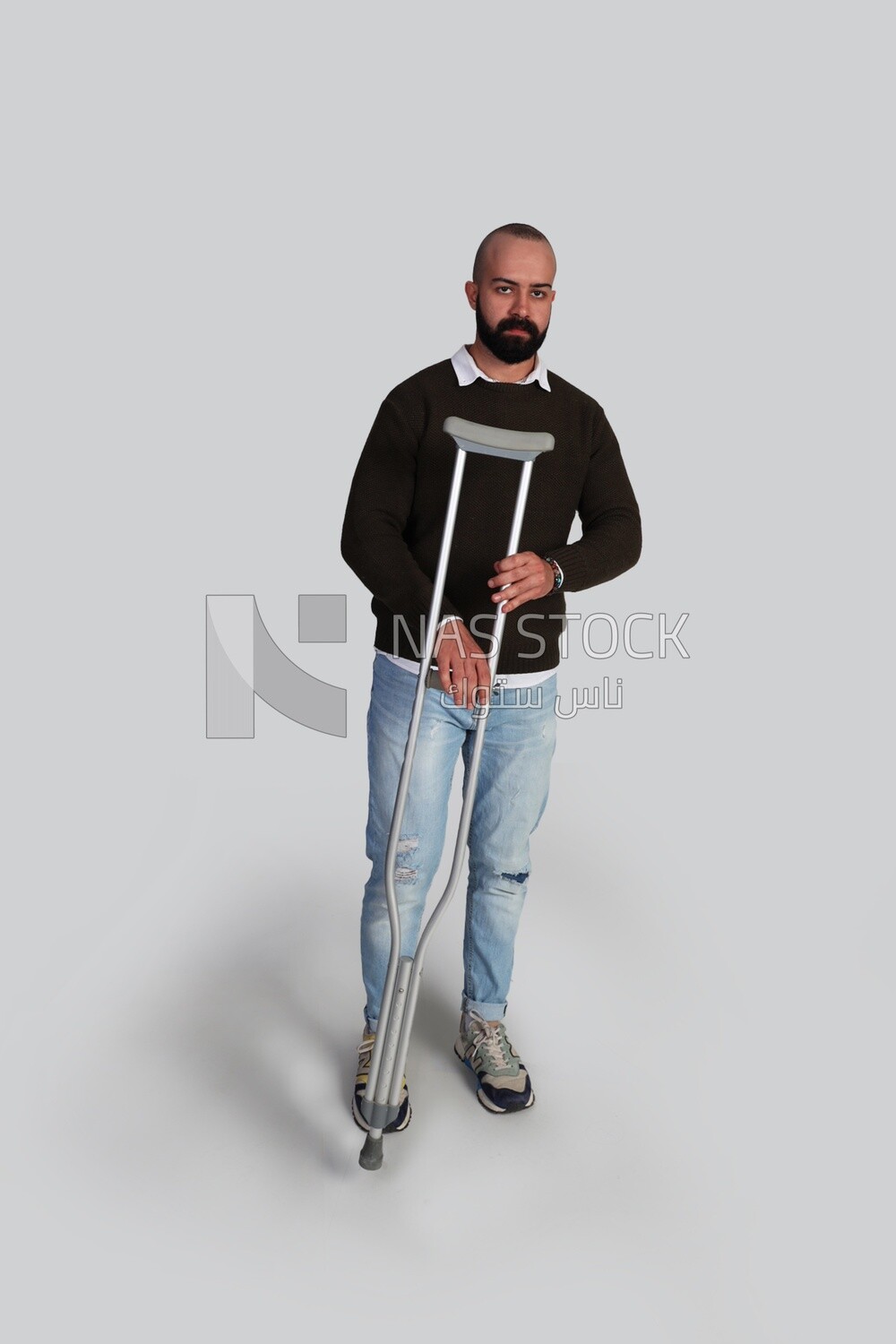 Man with crutch