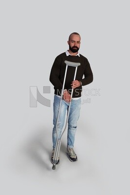 Man with crutch