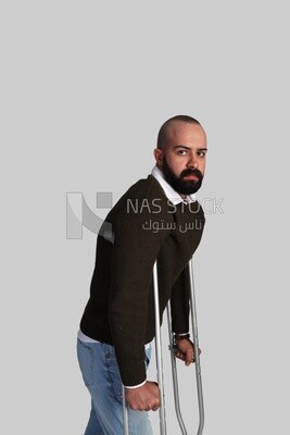 Man with crutch